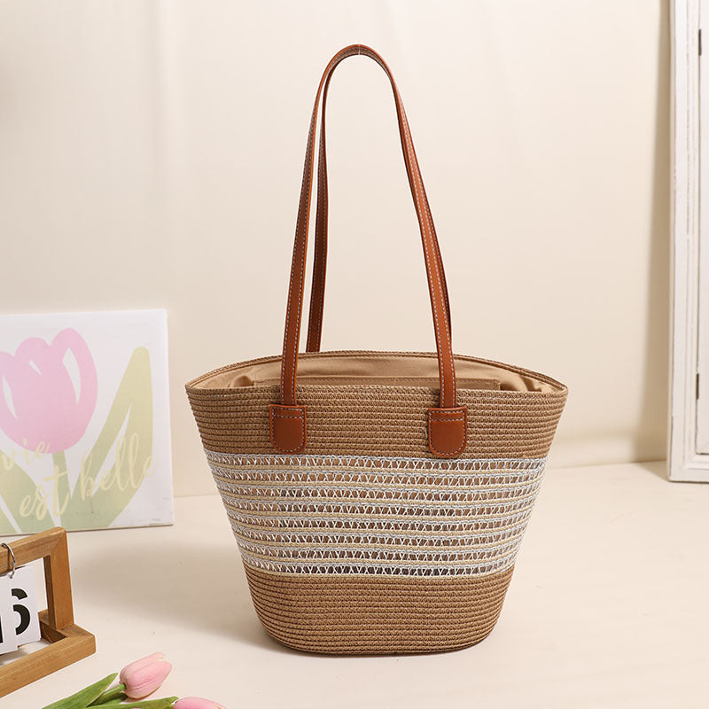 Elegant Bast bag with leather accents Bowlift