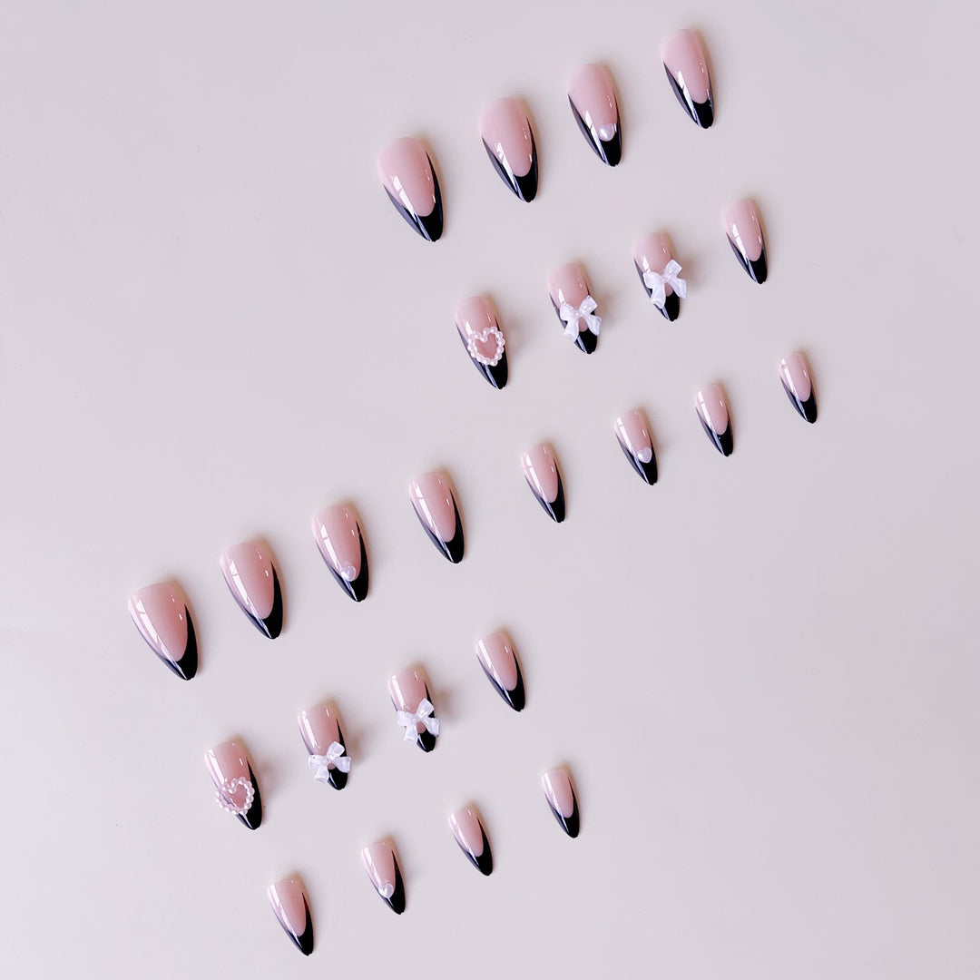 Glamorous artificial nail tips with 3D bows and heart decorations Bowlift
