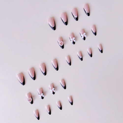 Glamorous artificial nail tips with 3D bows and heart decorations Bowlift