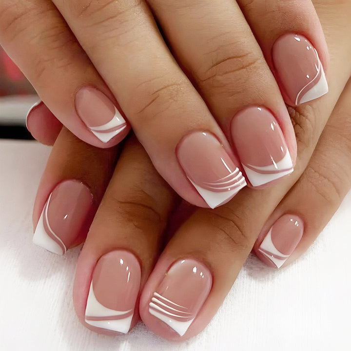 Artificial nail set with elegant French nail design and modern lines Bowlift