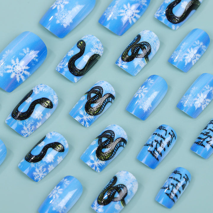 Creative art nails with snowflake and snake motif Bowlift