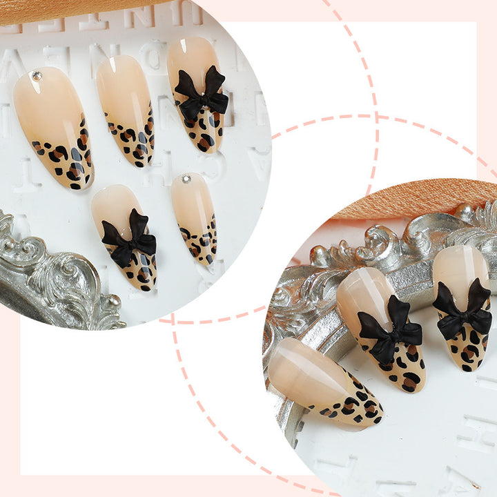 Creative nail set with leopard design and glitter accents Bowlift
