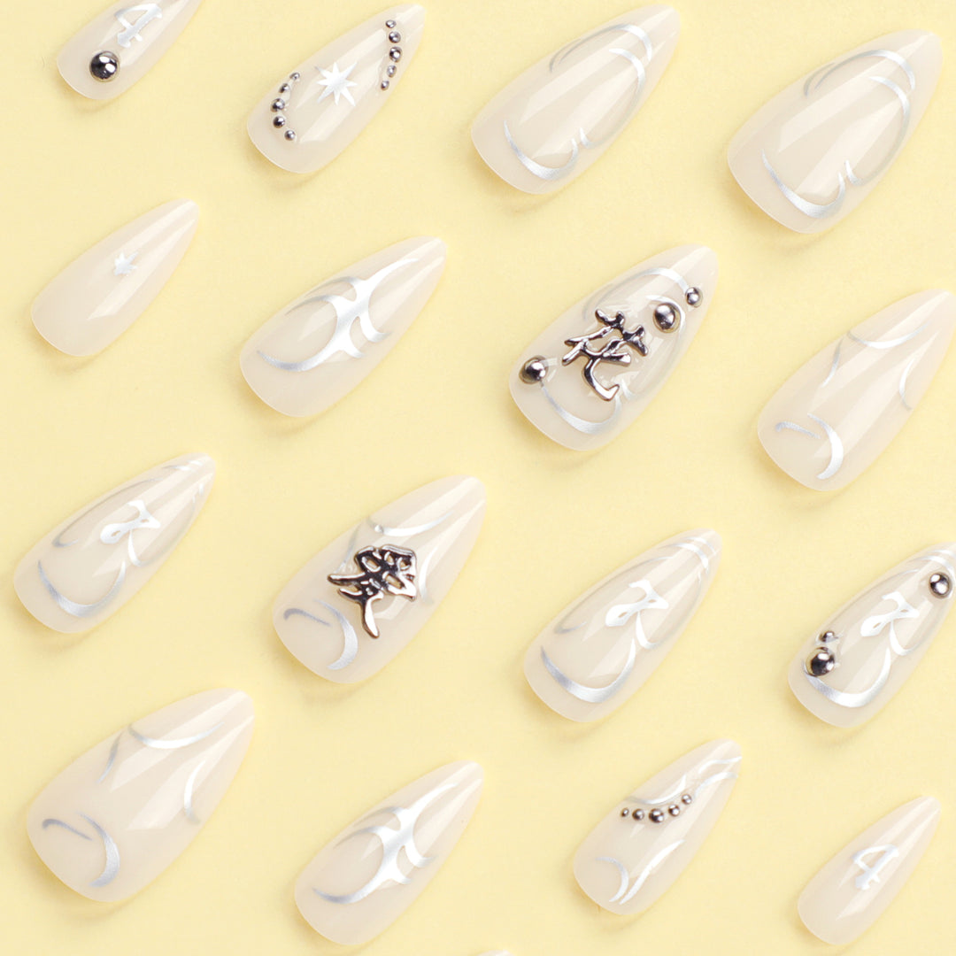 Artistic acrylic nails with elegant glitter patterns Bowlift