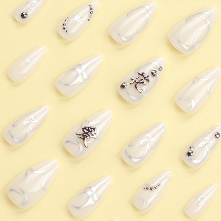 Artistic acrylic nails with elegant glitter patterns Bowlift
