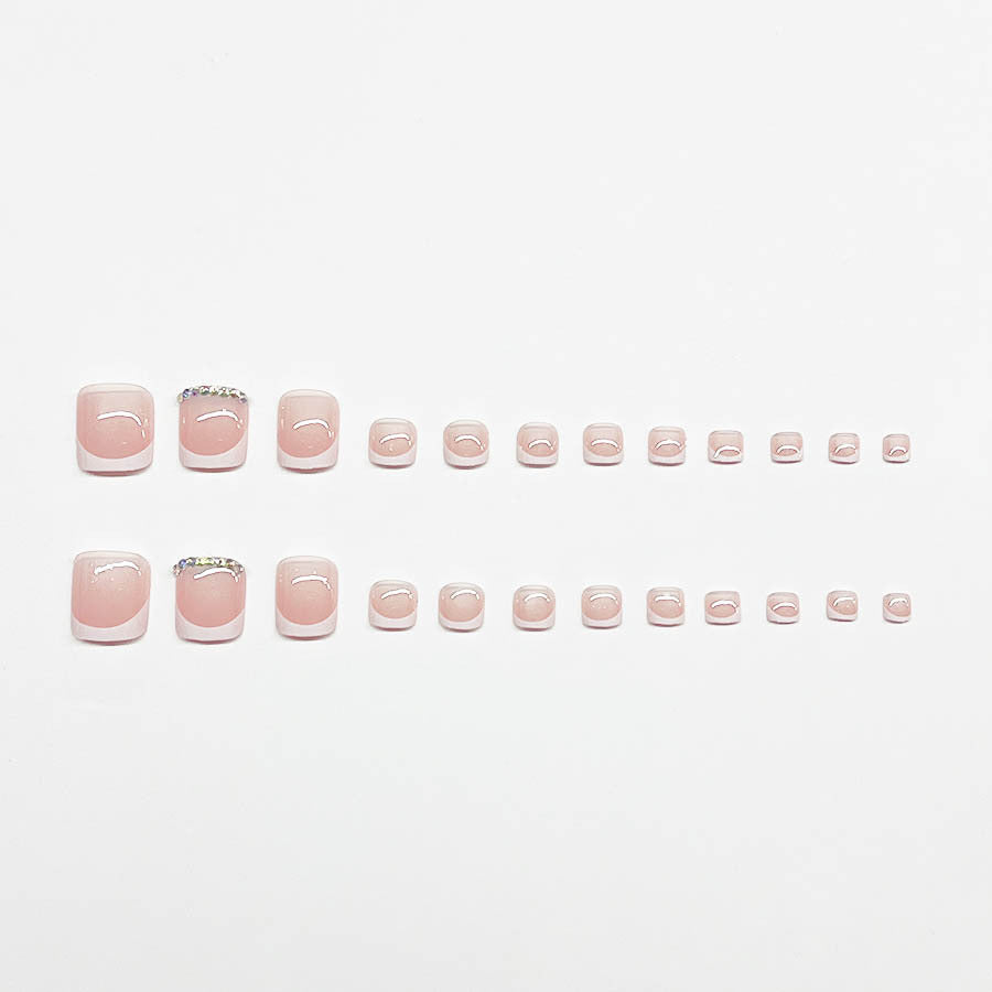 Nail art set with elegant French design and sparkling accents Bowlift