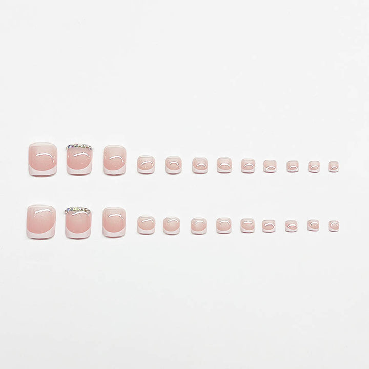 Nail art set with elegant French design and sparkling accents Bowlift