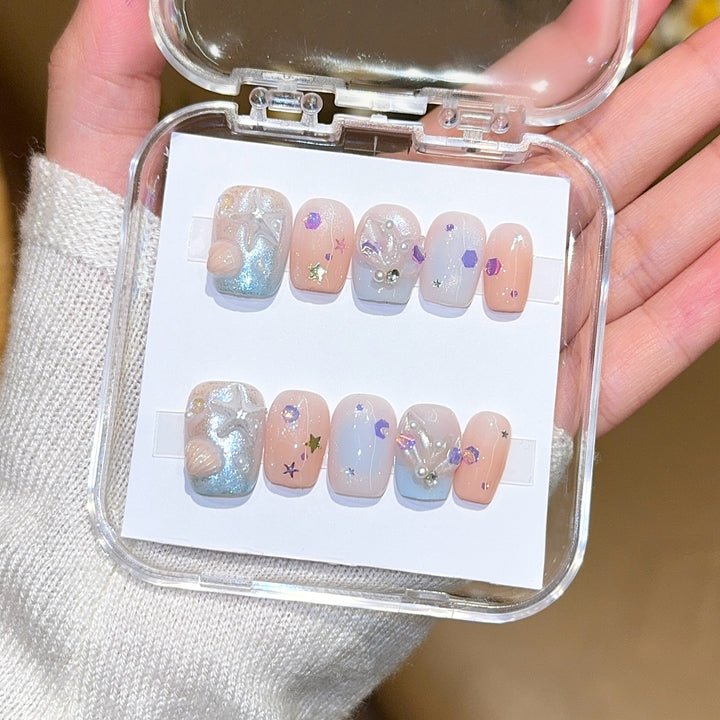 Artificial nails with sparkling galaxy design Bowlift
