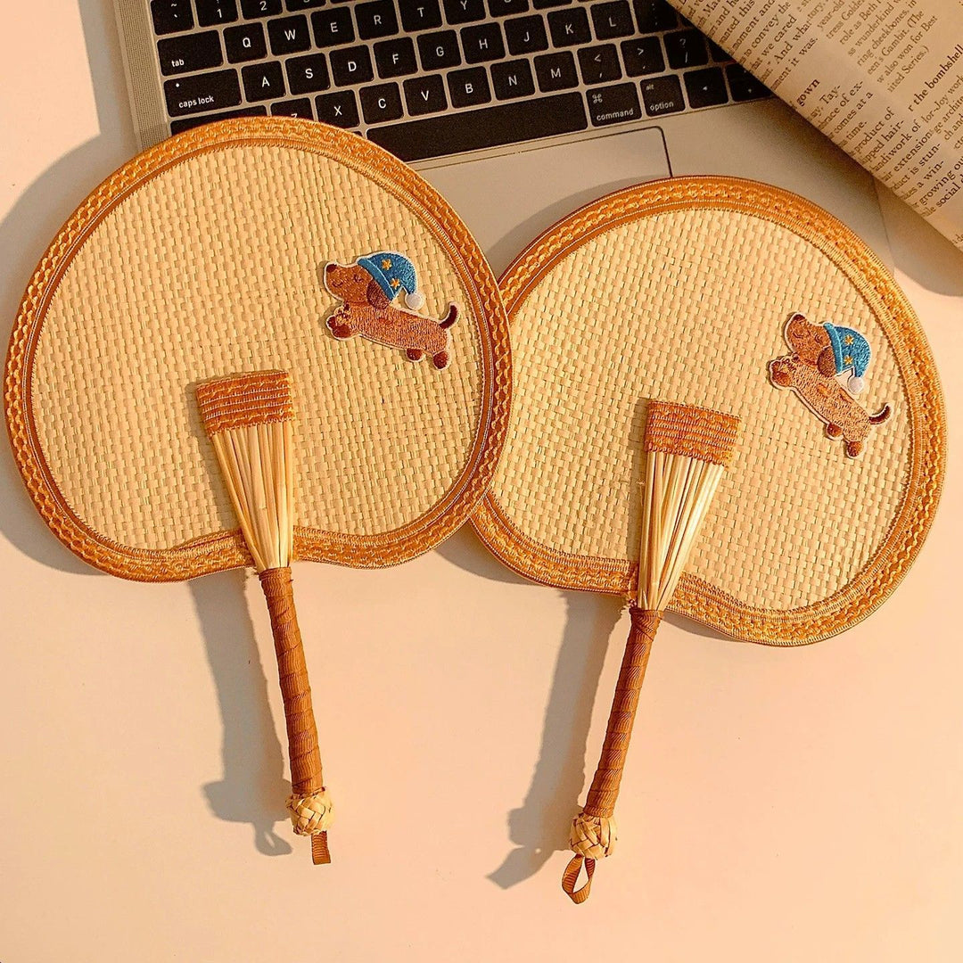 Handcrafted fan with playful dog motif Bowlift