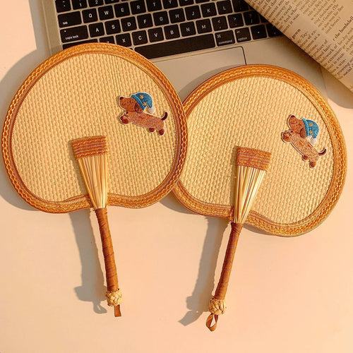 Handcrafted fan with playful dog motif Bowlift