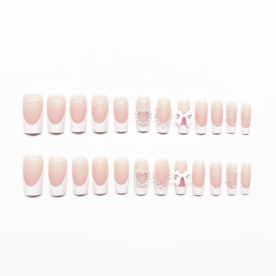 Artificial nail set with elegant 3D flowers and pearl embellishments Bowlift