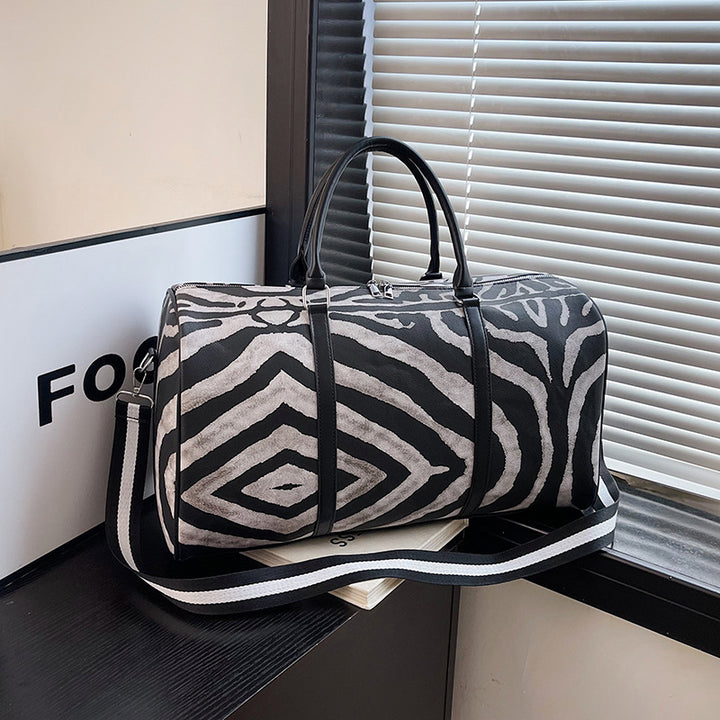 Sporty travel bag in trendy zebra pattern Bowlift