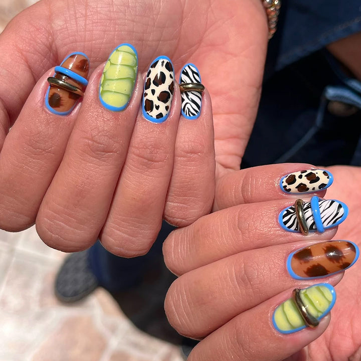 Creative art stick-on nails with modern animal motifs and colorful accents Bowlift