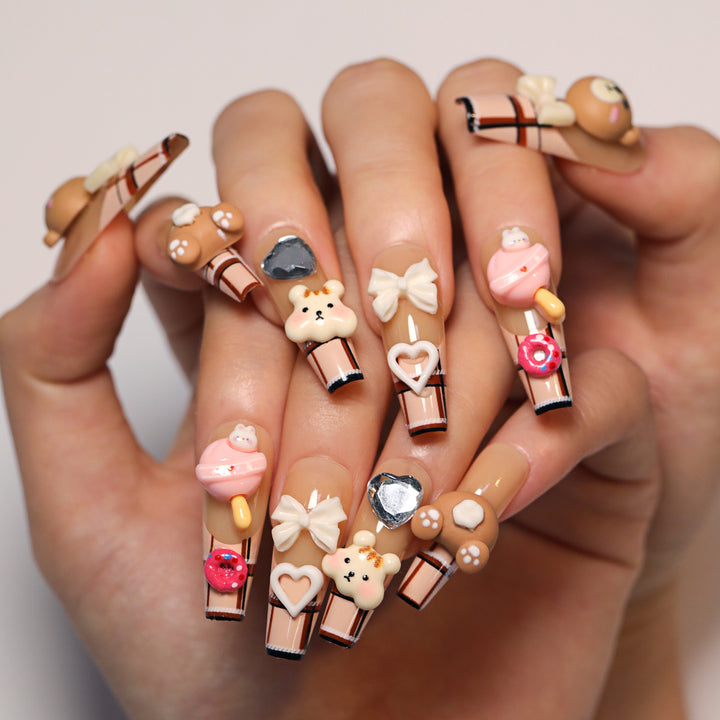 Artificial nail art with cute animal and candy motifs Bowlift