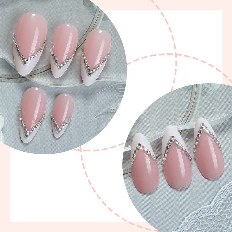 Elegant Pointed Press-On Nails with Rhinestone Accents Bowlift