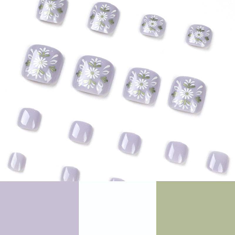 Artistic toenail design with elegant floral design Bowlift