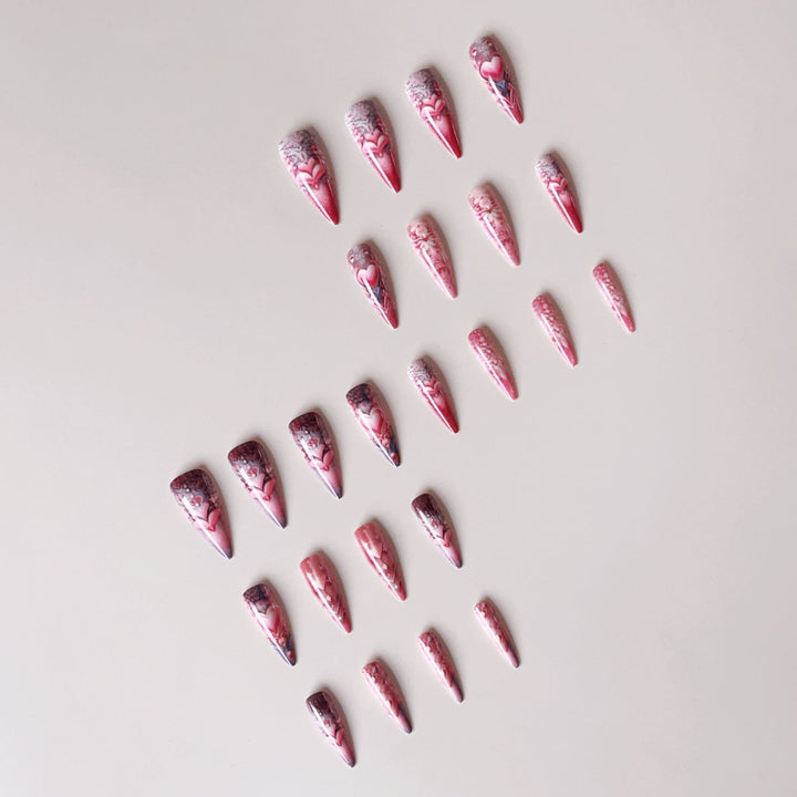 Artificial nail set with romantic 3D heart designs and luxurious embellishments Bowlift