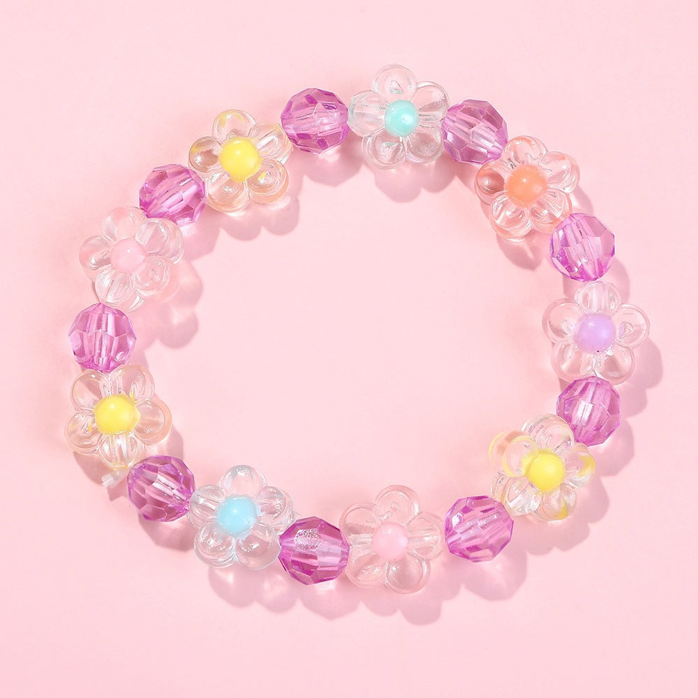 Friendship bracelet with colorful flower motifs Bowlift