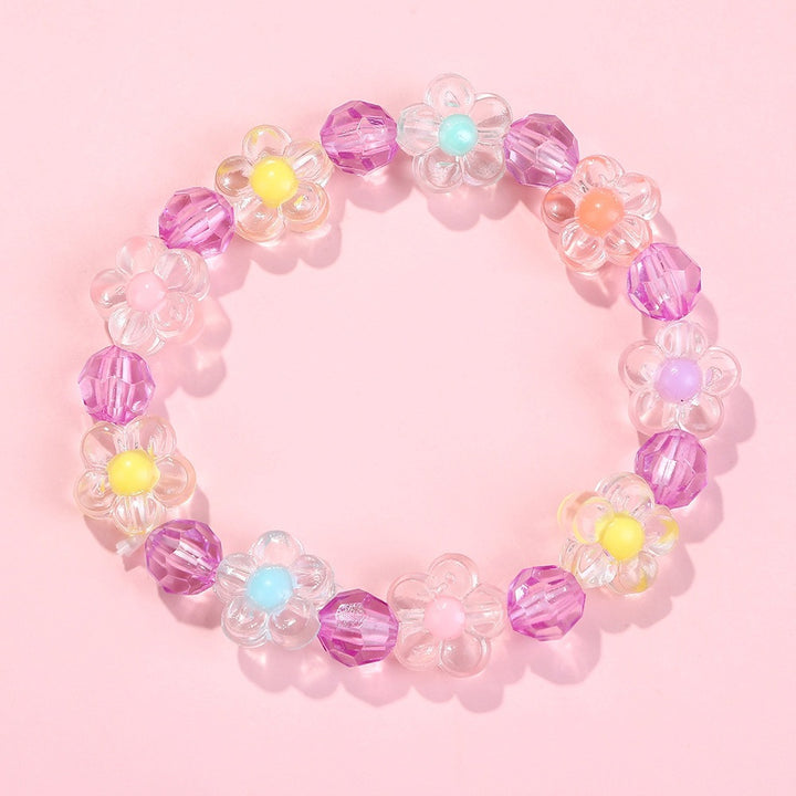 Friendship bracelet with colorful flower motifs Bowlift
