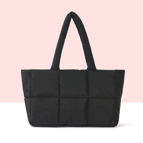 Padded carrying bag with modern quilted design Bowlift
