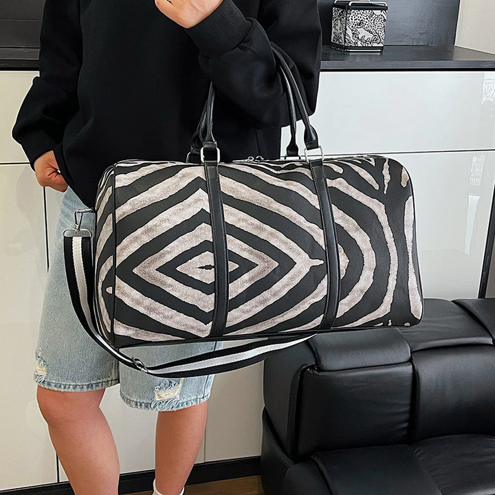 Sporty travel bag in trendy zebra pattern Bowlift