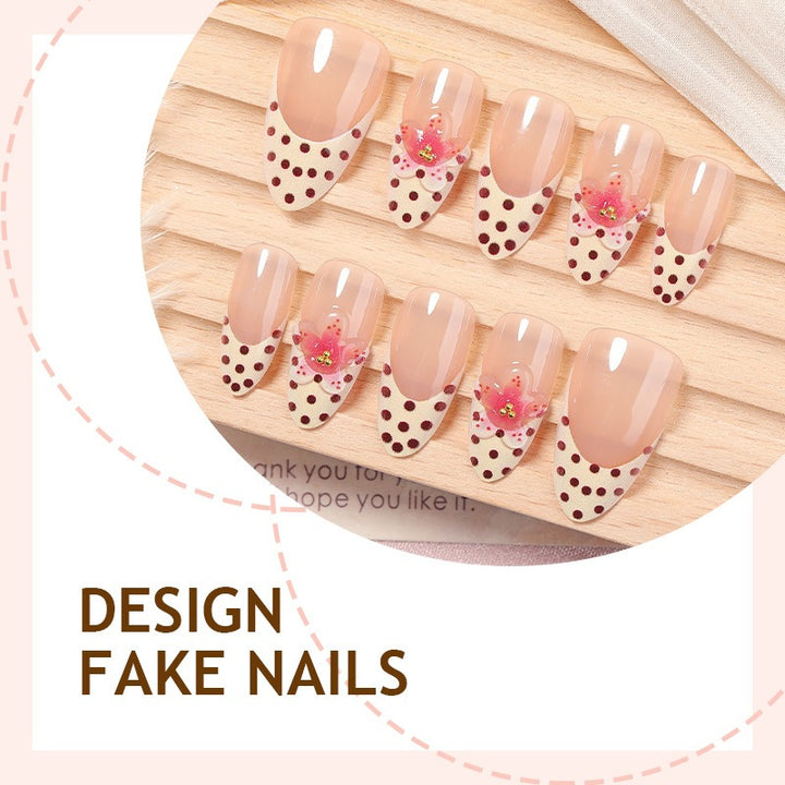 Acrylic nail set with romantic dots and floral accents Bowlift