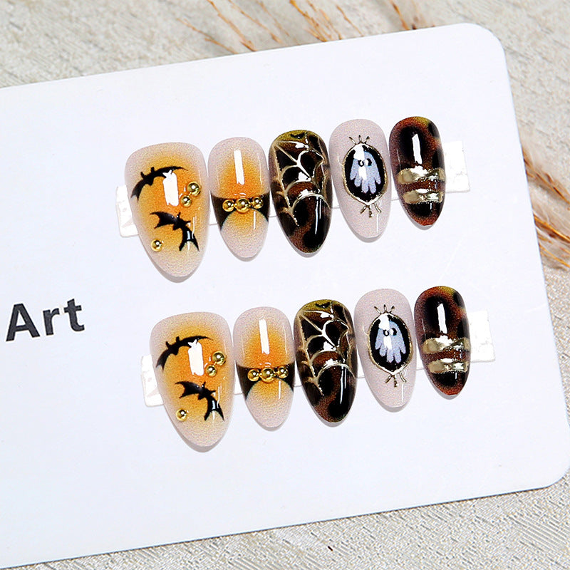 Artificial nails with Halloween motifs and glitter details Bowlift