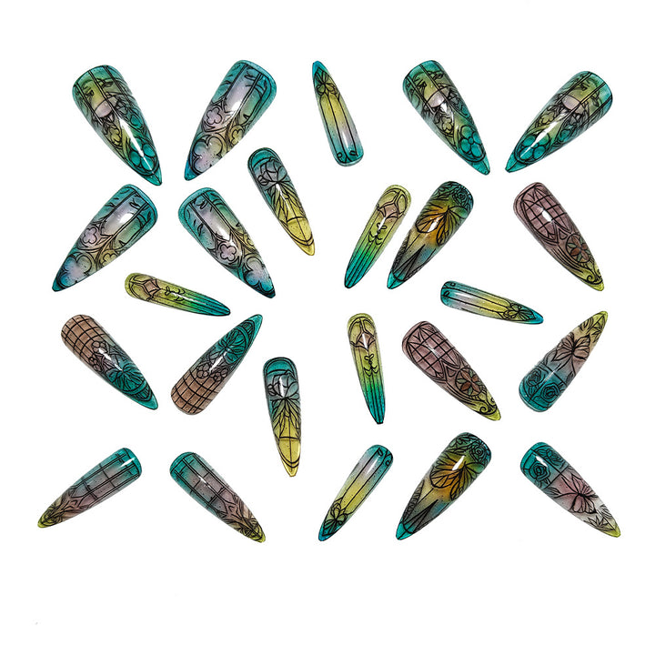 Artificial nails in elegant stiletto design with elaborate motifs Bowlift