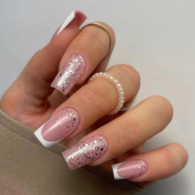 Artistic Nail Extensions with Glitter and French Tips Bowlift