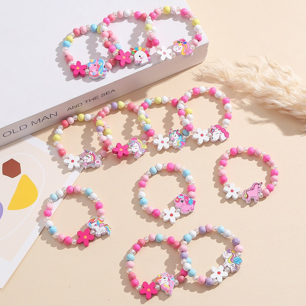 Playful children's bracelet with unicorn and flower motif Bowlift