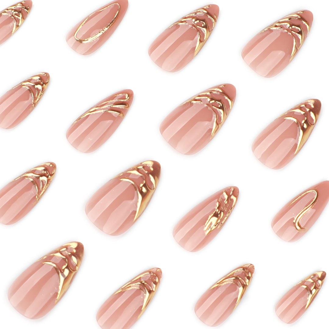 Artistic acrylic nails with gold embellishments Bowlift