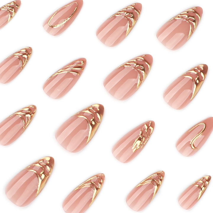 Artistic acrylic nails with gold embellishments Bowlift