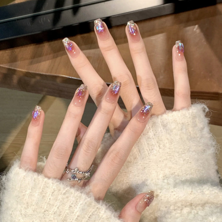 Glamorous artificial nails with glitter effects Bowlift