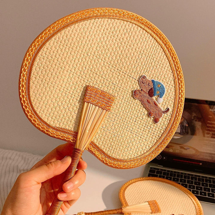 Handcrafted fan with playful dog motif Bowlift