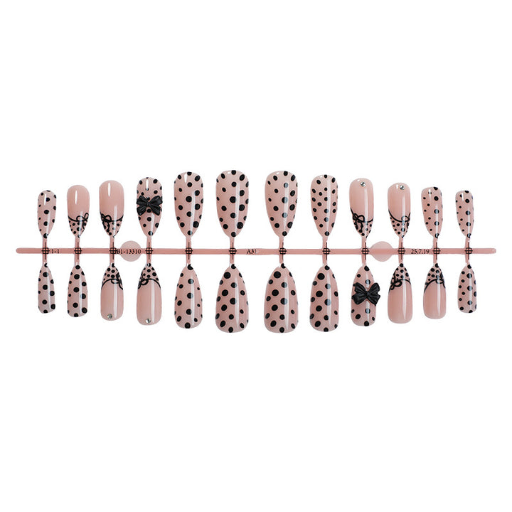 Artistic Press-On Nail Set with Polka Dot and Bow Designs Bowlift