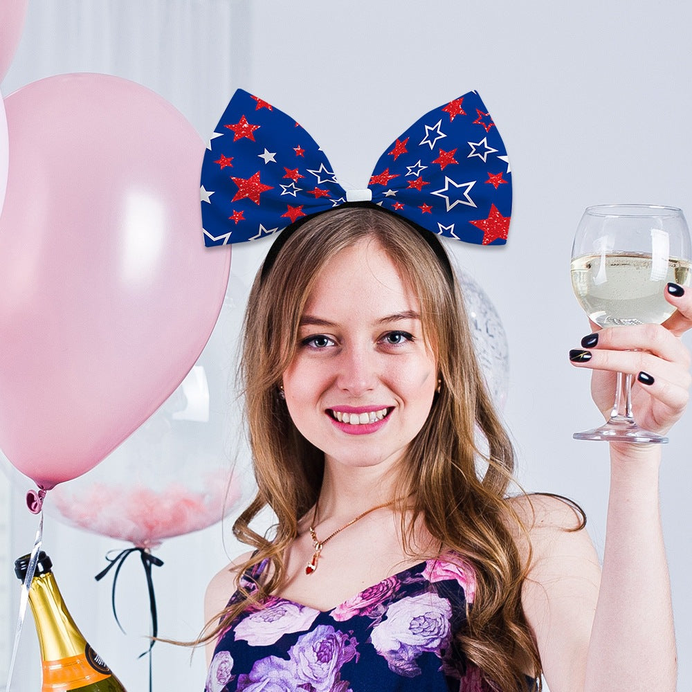 Ladies oversized bow headband with star pattern Bowlift