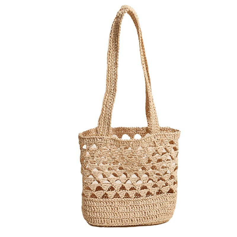 Handcrafted net straw bag with elegant straps Bowlift