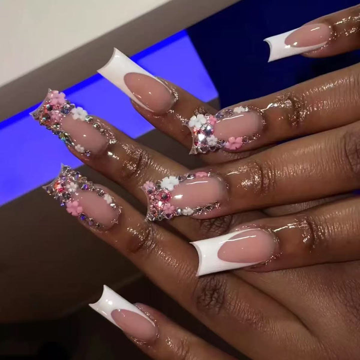 Artificial nail set with elegant 3D flowers and glitter embellishments Bowlift