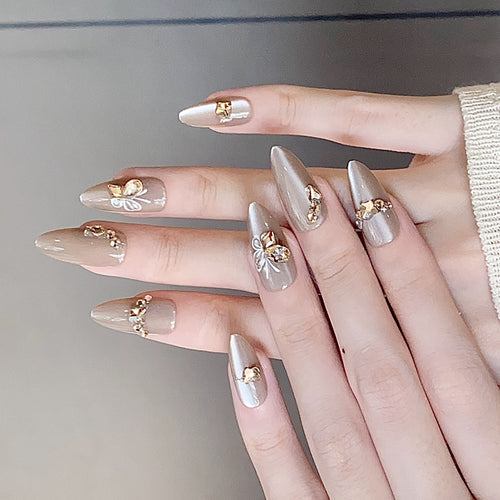 Decorative Stiletto Press-On Nails with Gemstone and Floral Accents Bowlift