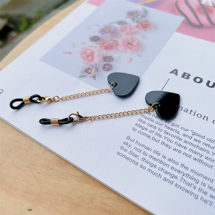 Heart-Shaped Dangle Earrings with Golden Chain Bowlift