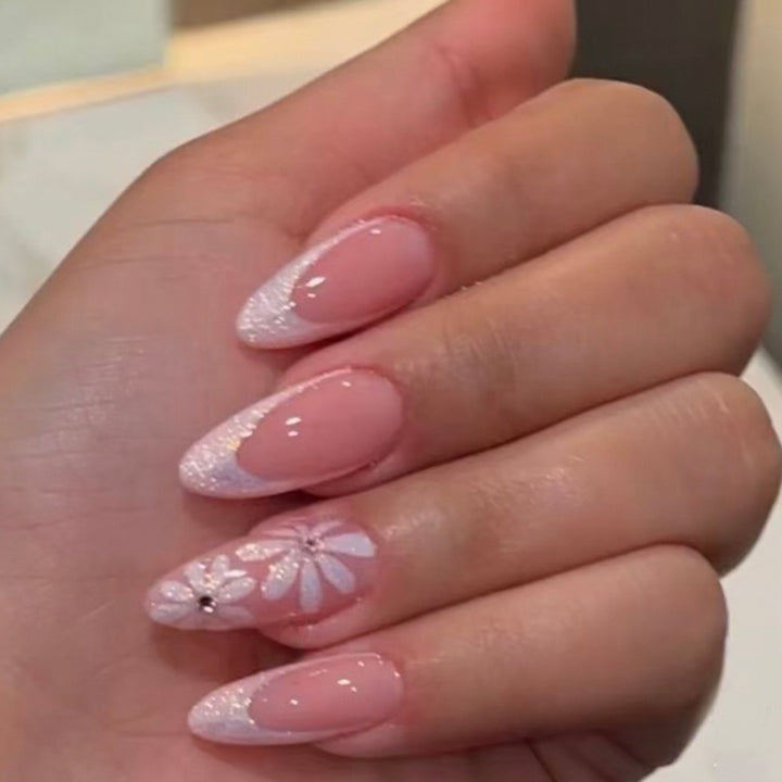 Artful Nail Art with Flower Design and Blue French Tip Bowlift