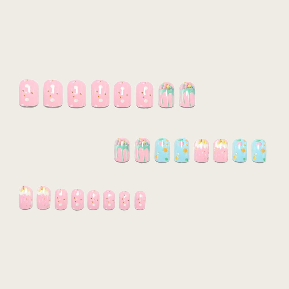 Artificial nails with playful cupcake design Bowlift