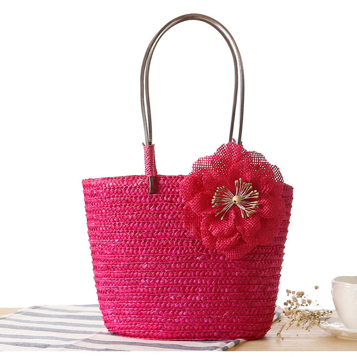 Beach bag with decorative flower detail embellishment Bowlift