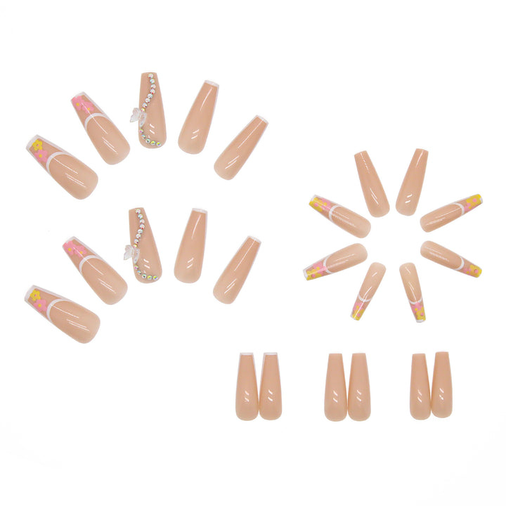 Artificail nail tips in elegant French design with floral accent Bowlift