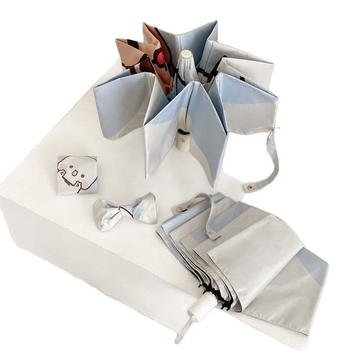 Ladies folding umbrella with playful animal motif Bowlift