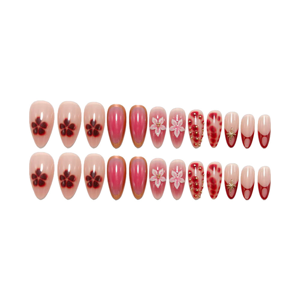 Artificial nails with floral and glitter accents Bowlift