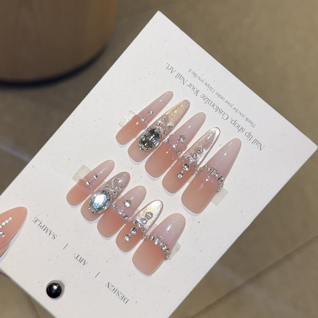 Artificial nails with elegant crystal decorations Bowlift