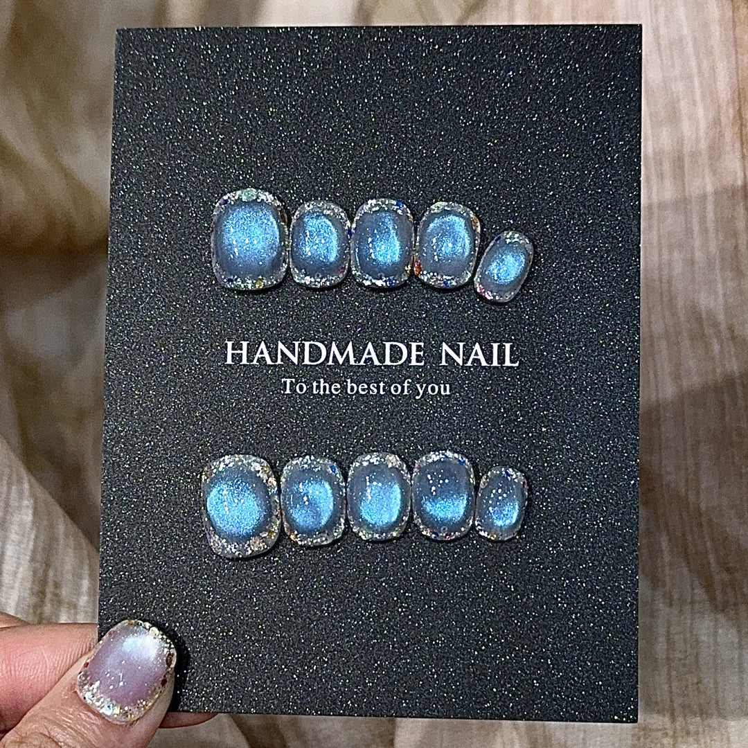 Handmade art nails with shimmering effects Bowlift