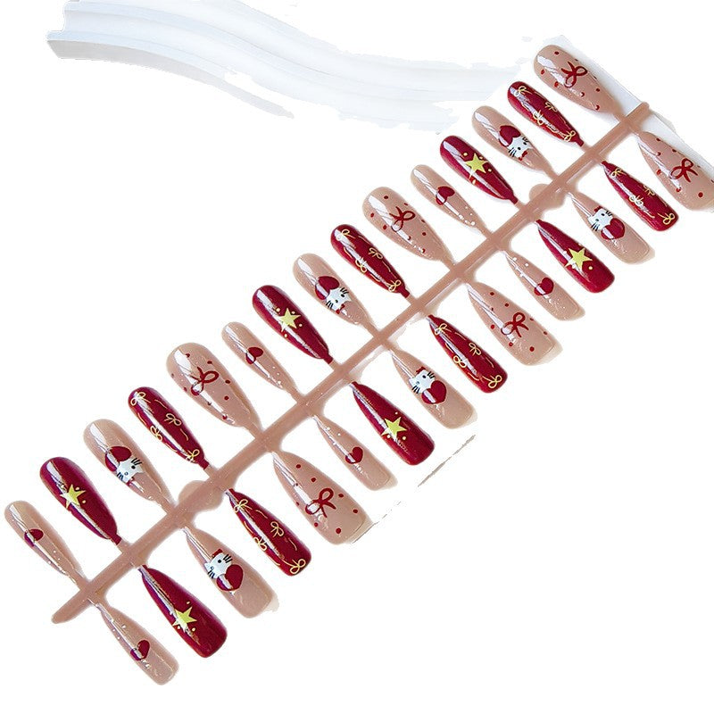 Artificial nails in festive Christmas design Bowlift