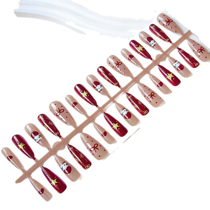 Artificial nails in festive Christmas design Bowlift