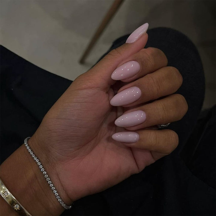 Acrylic nail set with luxurious color gradient and elegant lace accent Bowlift